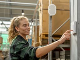 AXIS C1111-E from AXIS COMMUNICATIONS - and AXIS C8310 in warehouse